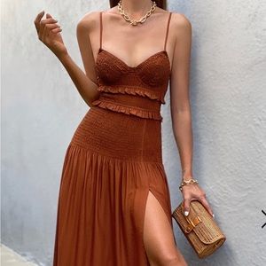 Beautiful orange dress with high slit.